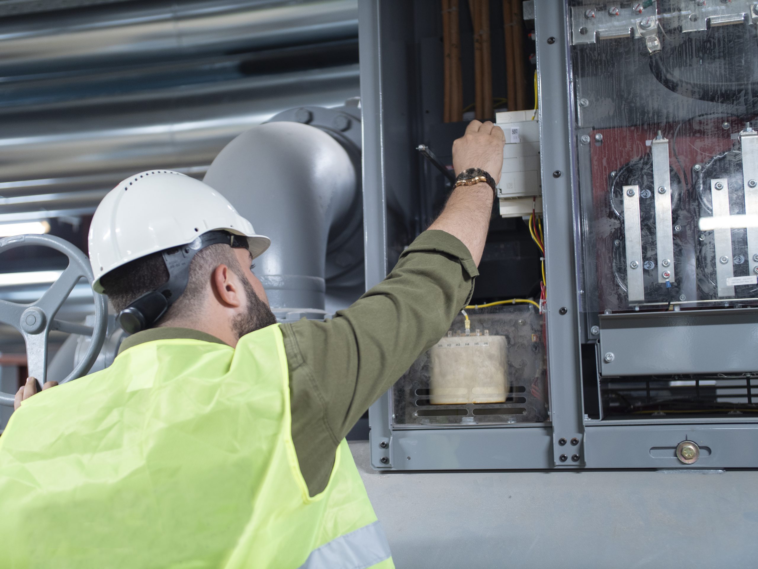 Engineer Checking The Panel Engineer Checking The Panel